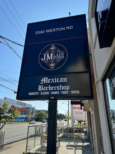 JM Lady Barber black and gold street signage